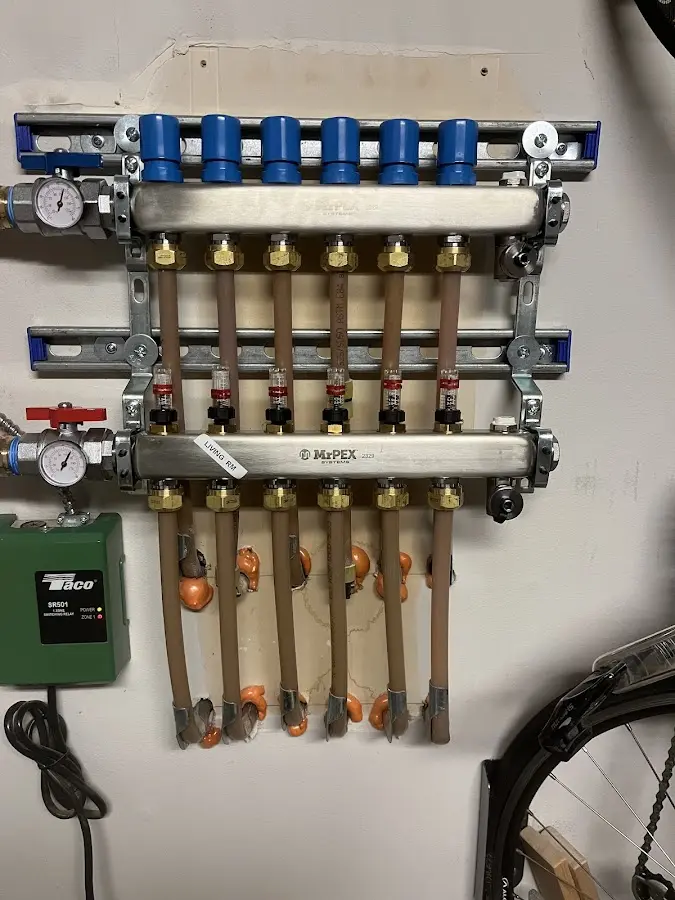 Plumber performing Water Heater Repair at a residential property in Vine Grove